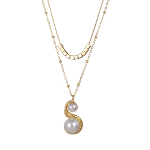 French vintage double-layered necklace with gold cubes, S-curve pendant, and pearls