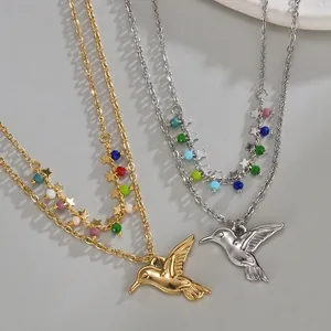 Double-layered hummingbird necklace with colorful beads and stars in gold and silver
