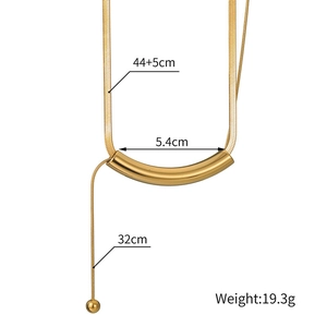 Detailed view of gold tube necklace with long tassels and precise length measurements