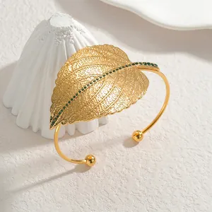 French vintage gold leaf open cuff bracelet with green rhinestones and vein texture