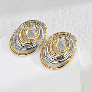Minimalist geometric oval hoop earrings with gold-silver mixed spiral lines for women