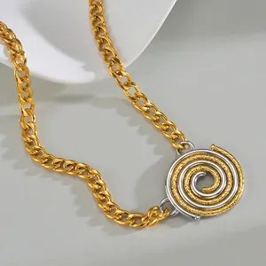 Two-tone mixed gold and silver spiral disc necklace with chunky cuban link chain