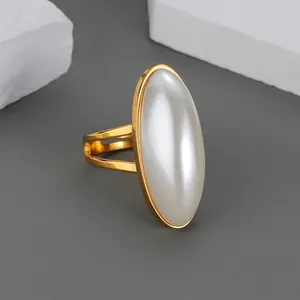 Elegant gold oval pearl ring with minimalist double-band design for women