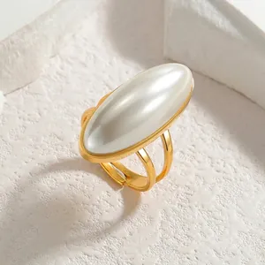 Fashionable adjustable gold stainless steel ring with large oval white pearl for women