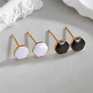 Minimalist hexagonal geometric stud earrings in black and white with gold finish