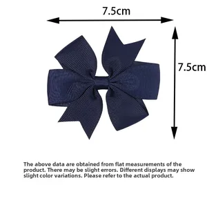 Detail view of dark blue velvet ribbon hair bow showing 7.5cm measurement for children