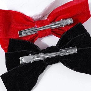 Classic large velvet bow hair clips in red and black with silver alligator clips