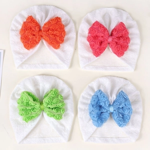 Set di quattro turbanti in pizzo per neonati con grandi fiocchi di rose 3D colorati