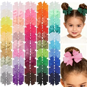 Detail of 40-color ribbon bow hair clip set shown in grid and on child model