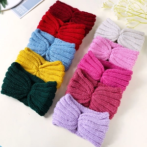 Knitted cross headbands in multiple solid colors for warm winter hair styling