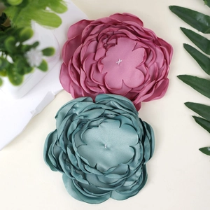 Handmade 10cm layered fabric flowers in pink and teal for DIY hair accessories and decor