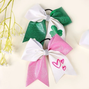 Glitter hair bows with clover and heart patterns for St. Patrick's and Valentine's Day
