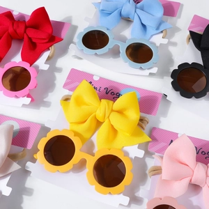 Ensemble bandeau bébé avec nœud et lunettes de soleil fleurs en plusieurs coloris