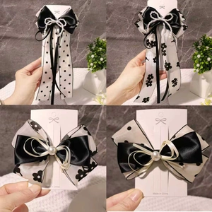 Barrettes à nœuds classiques noir et blanc avec perles et rubans pour les filles