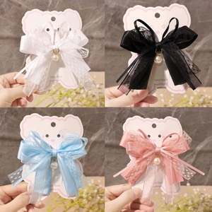Handmade lace bow hair clips for girls in black, white, blue, and pink four-color set