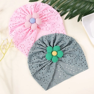 Two-pack breathable hollow baby turban hats in pink and gray with 3D floral accents