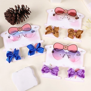 Children gradient heart sunglasses and bow hair clip set on aesthetic display cards