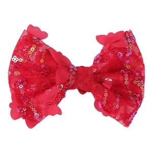 Macro shot of large red sequined mesh bow hair clip with 3D butterfly appliqué details