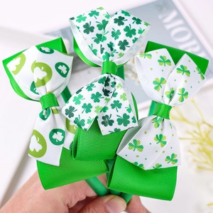 Tre cerchietti per San Patrizio con fiocchi di trifoglio verde per bambini