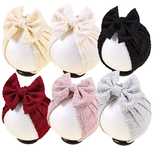 Lot de 6 bandeaux bébé avec nœuds en tricot texturé à pois dans diverses couleurs neutres