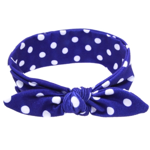 Navy blue cotton baby headband with white polka dots and cute bunny ear knot design