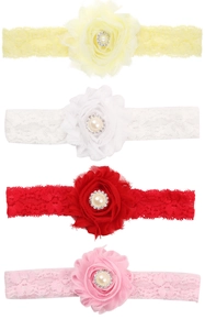 Detailansicht von elastischen Spitzenstirnbändern mit Stoffblumen und Glitzersteinen