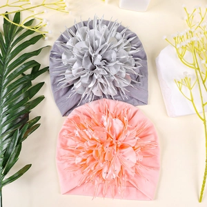 Cute newborn baby girl turban caps with large shiny flower petals in pink and grey