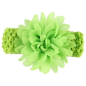 Elastic baby headband with a large light green chiffon flower for infants and children