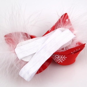 Christmas baby headband featuring red snowflake bow with soft white feather trim