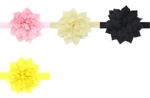 Détail de quatre bandeaux bébé avec fleurs de lotus en tissu coloré et élastiques fins