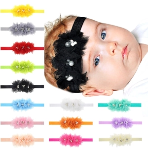 Lot de 14 bandeaux bébé aux couleurs variées avec trois fleurs en tulle et perles