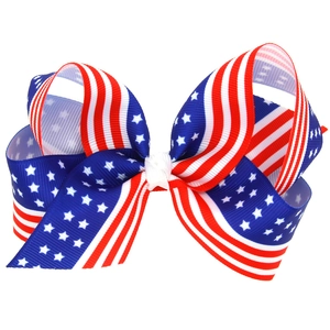 Barrette nœud drapeau USA pour bébés avec motifs étoiles et rayures rouges blanches et bleues
