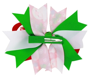 Detail view of the back showing the green fabric-wrapped alligator clip on the bow