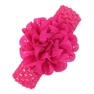 Bright pink hollow mesh baby headband featuring a large layered floral lace decoration