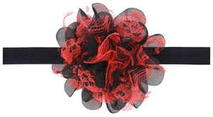 Detailed view of baby headband featuring layered red lace and black mesh fabric flower
