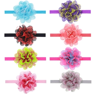 Detailed set of eight colorful elastic baby headbands with large lace chiffon flowers