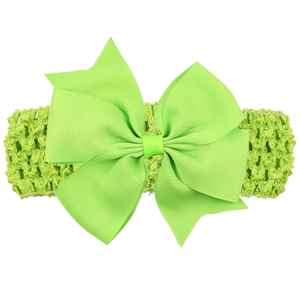 Neon green baby headband with large ribbed double bow and elastic crochet band