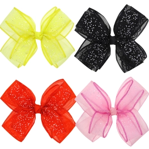 Set of four girls' mesh bow hair clips with glitter sequins in yellow, black, red, and pink