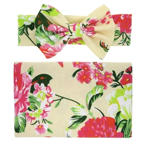 Floral baby swaddle blanket and matching headband set with pink rose patterns