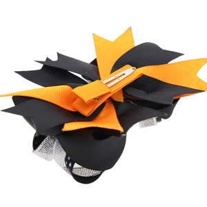 Halloween layered bow hair clip with orange ribbing and metallic silver glitter fabric