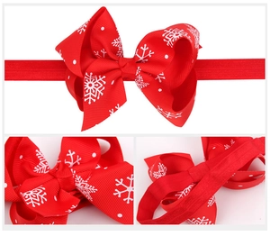 Detailed views of red Christmas bow headband with snowflake patterns on elastic band