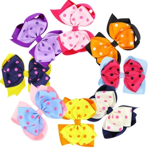 Detailed close-up of 8-piece set double layer grosgrain ribbon polka dot hair clips