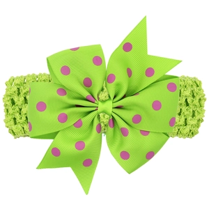 Bandeau bébé avec gros nœud à pois et bande élastique au crochet vert fluo