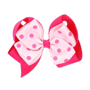 Double-layered pink polka dot bow hair clip for girls made of grosgrain ribbon