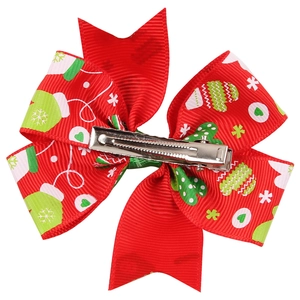 Christmas red ribbon bow hair clip with festive glove patterns and metal alligator grip