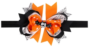 Fiocco per capelli Halloween con ragnatela e dettaglio pipistrello su fascia elastica
