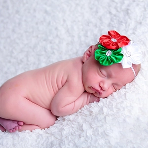Christmas baby headband with red green and white satin flowers and rhinestones