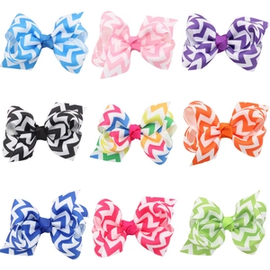 Detail showing assorted multi-colored chevron grosgrain ribbon bows for baby girls
