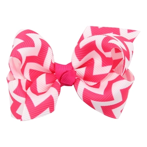 Handmade pink and white chevron patterned wave bow hair clip for babies and girls
