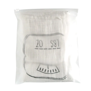 White cotton baby milestone swaddle with weight scale print in frosted zipper packaging